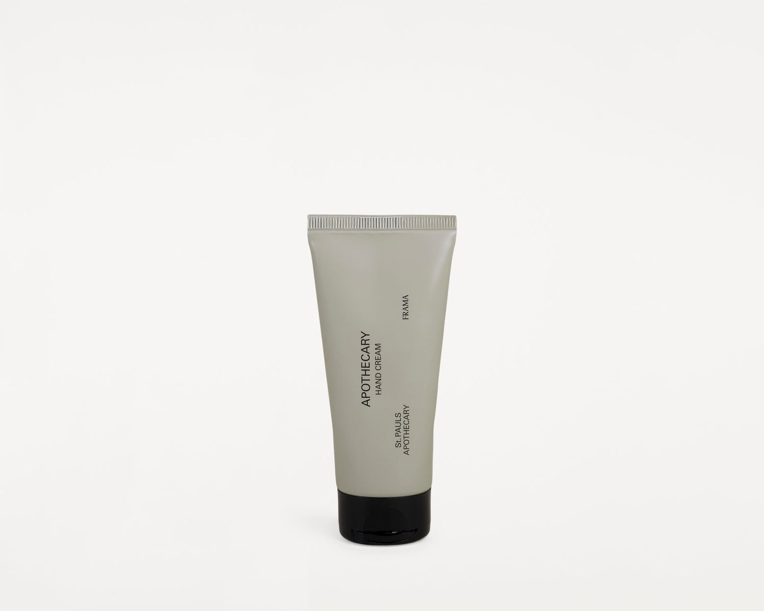 En tube håndcreme "FRAMA APOTHECARY HAND CREAM ST. PAULS APOTHECARY" står oprejst mod en hvid baggrund.